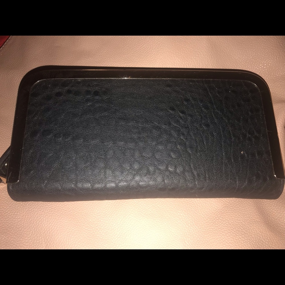 Black wallet with gold detail